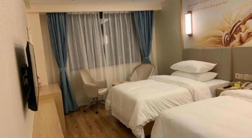 Bed in Vienna Hotel Kunming Baiyun Road Metro Station Jiang'an