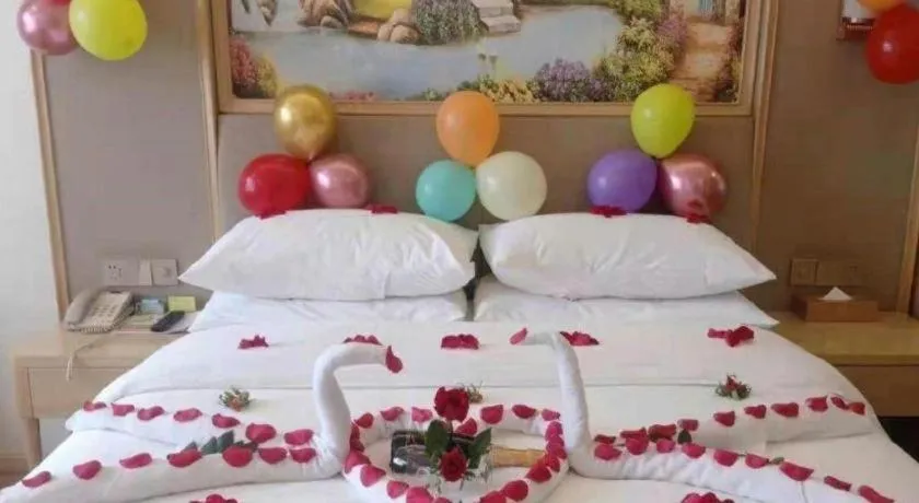 Bed in Vienna Hotel Kunming Baiyun Road Metro Station Jiang'an