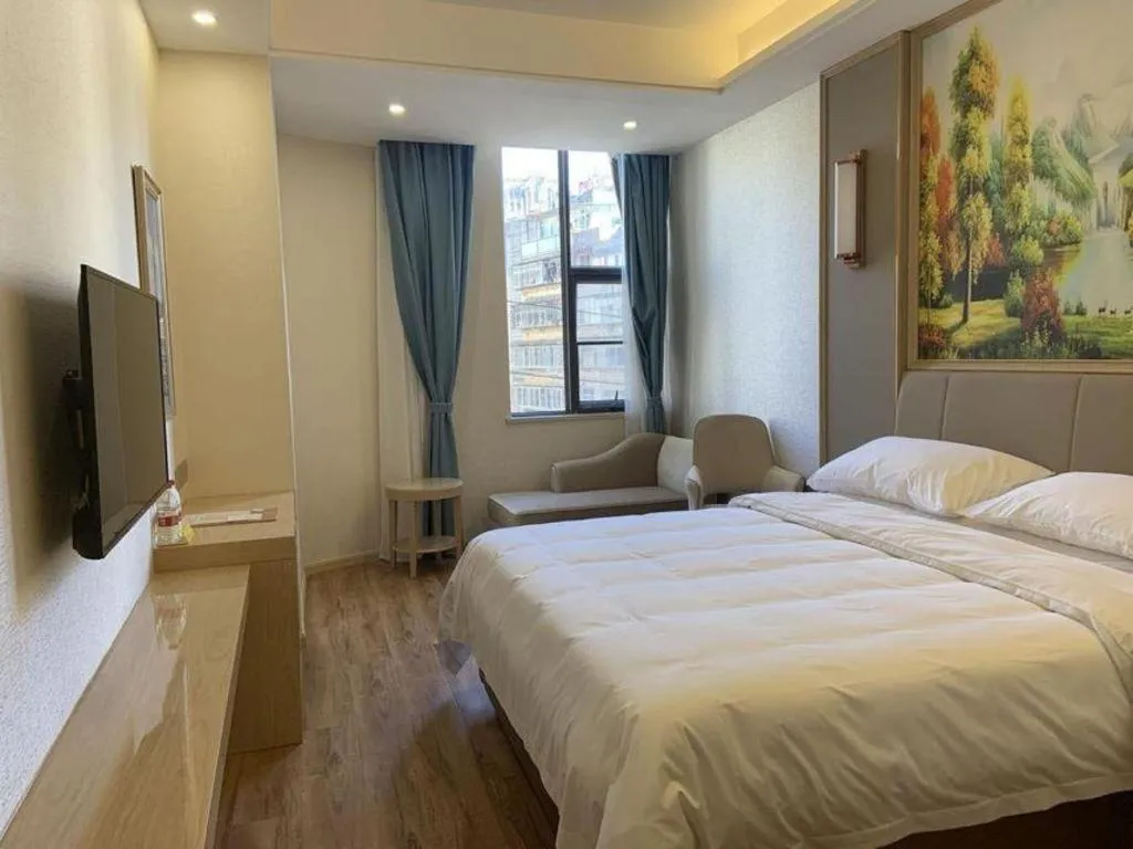 Bed in Vienna Hotel Kunming Baiyun Road Metro Station Jiang'an