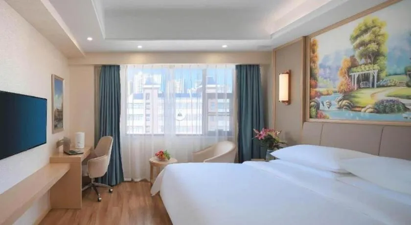 Bed in Vienna Hotel Kunming Baiyun Road Metro Station Jiang'an