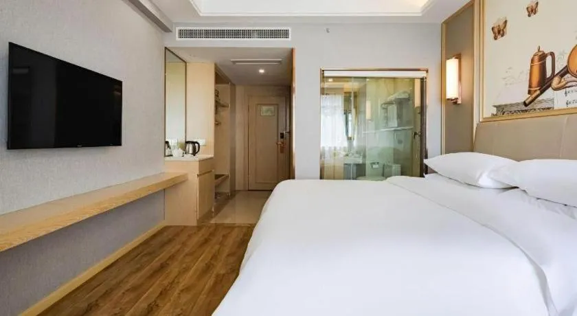 Bed in Vienna Hotel Kunming Baiyun Road Metro Station Jiang'an