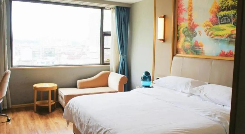 Bed in Vienna Hotel Kunming Baiyun Road Metro Station Jiang'an