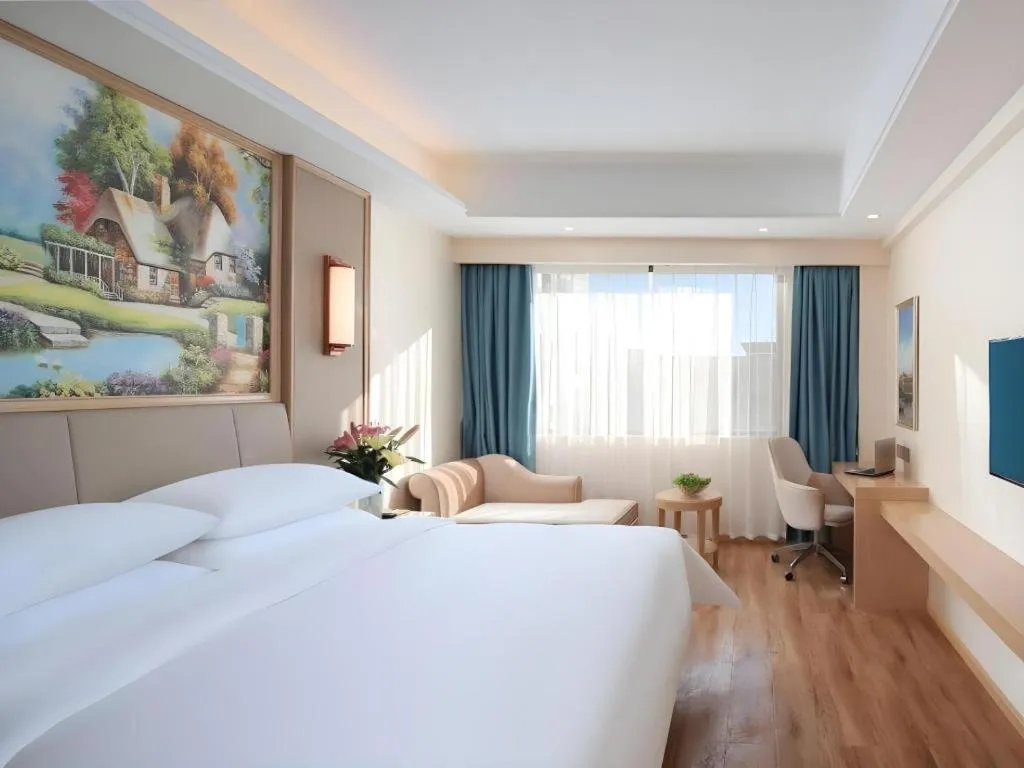 Bed in Vienna Hotel Kunming Baiyun Road Metro Station Jiang'an