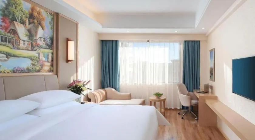 Bed in Vienna Hotel Kunming Baiyun Road Metro Station Jiang'an