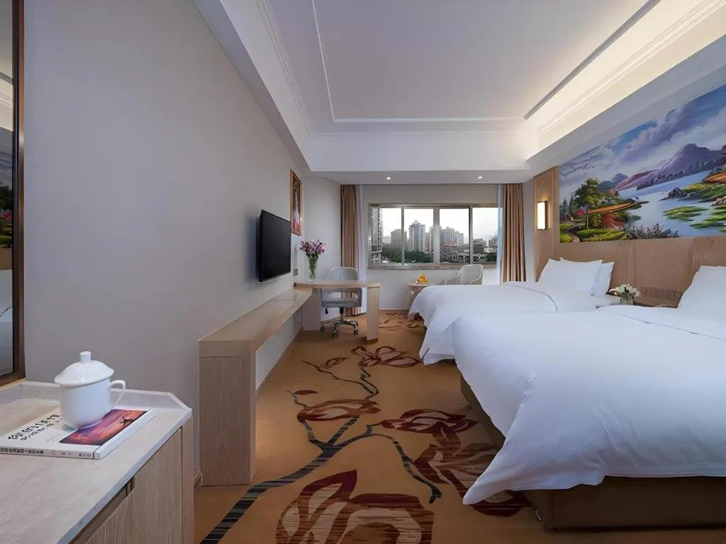 Bed in Vienna Hotel Chongqing Jiangjin Shuangfu