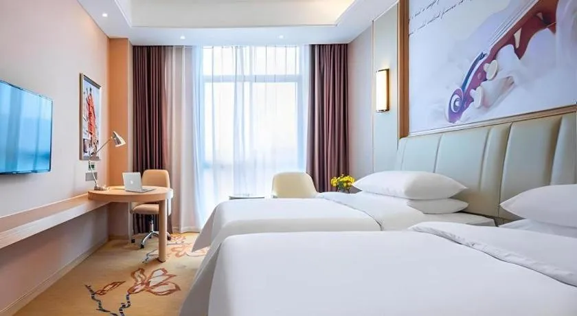 Bed in Vienna Hotel Chongqing Jiangjin Shuangfu