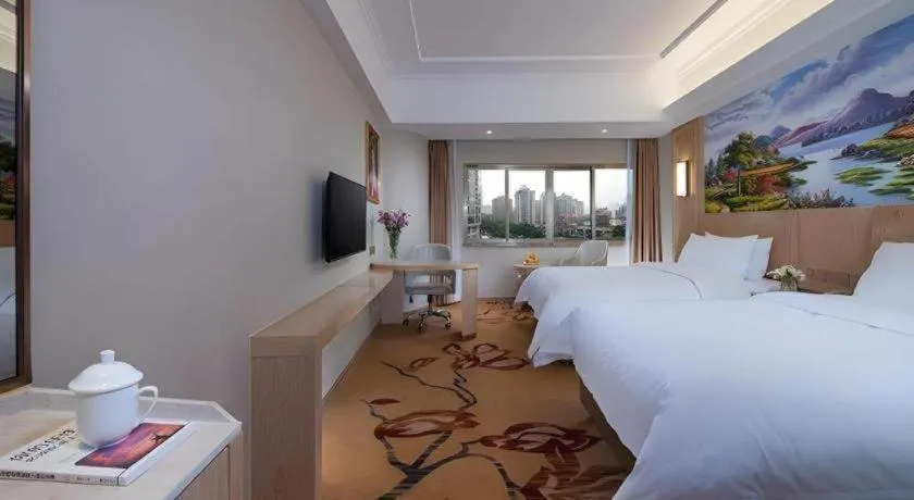 Bed in Vienna Hotel Chongqing Jiangjin Shuangfu