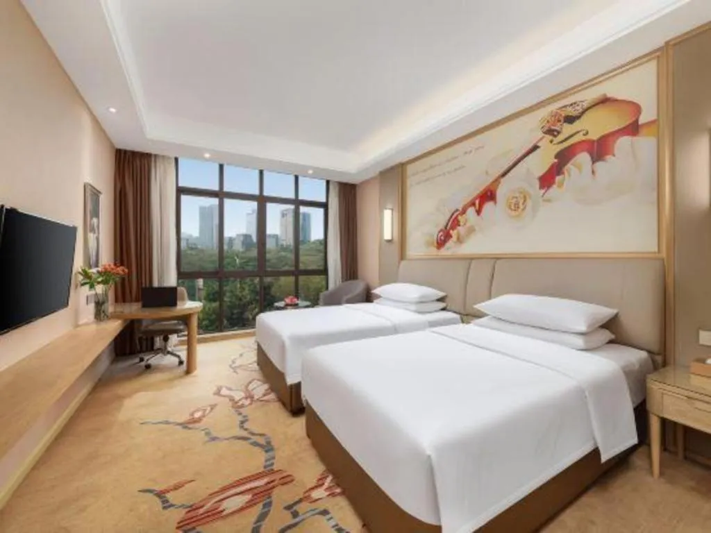 Bed in Vienna Hotel Chongqing Jiangjin Shuangfu