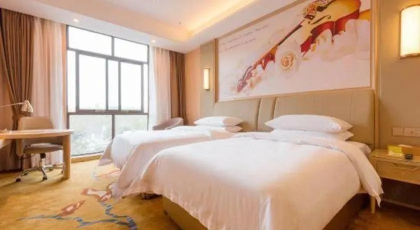 Bed in Vienna Hotel Chongqing Jiangjin Shuangfu