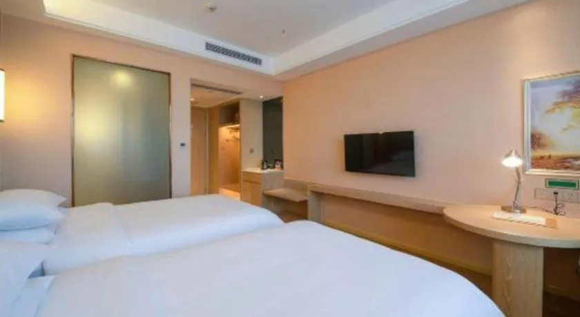 Bed in Vienna Hotel Chongqing Jiangjin Shuangfu