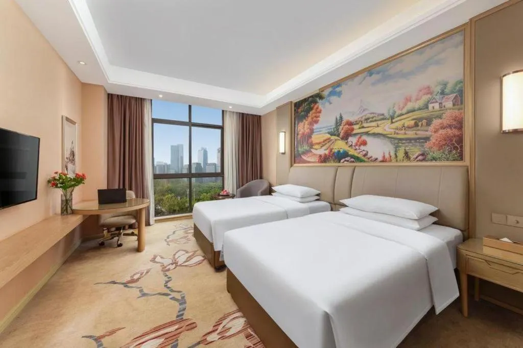 Bed in Vienna Hotel Chongqing Jiangjin Shuangfu