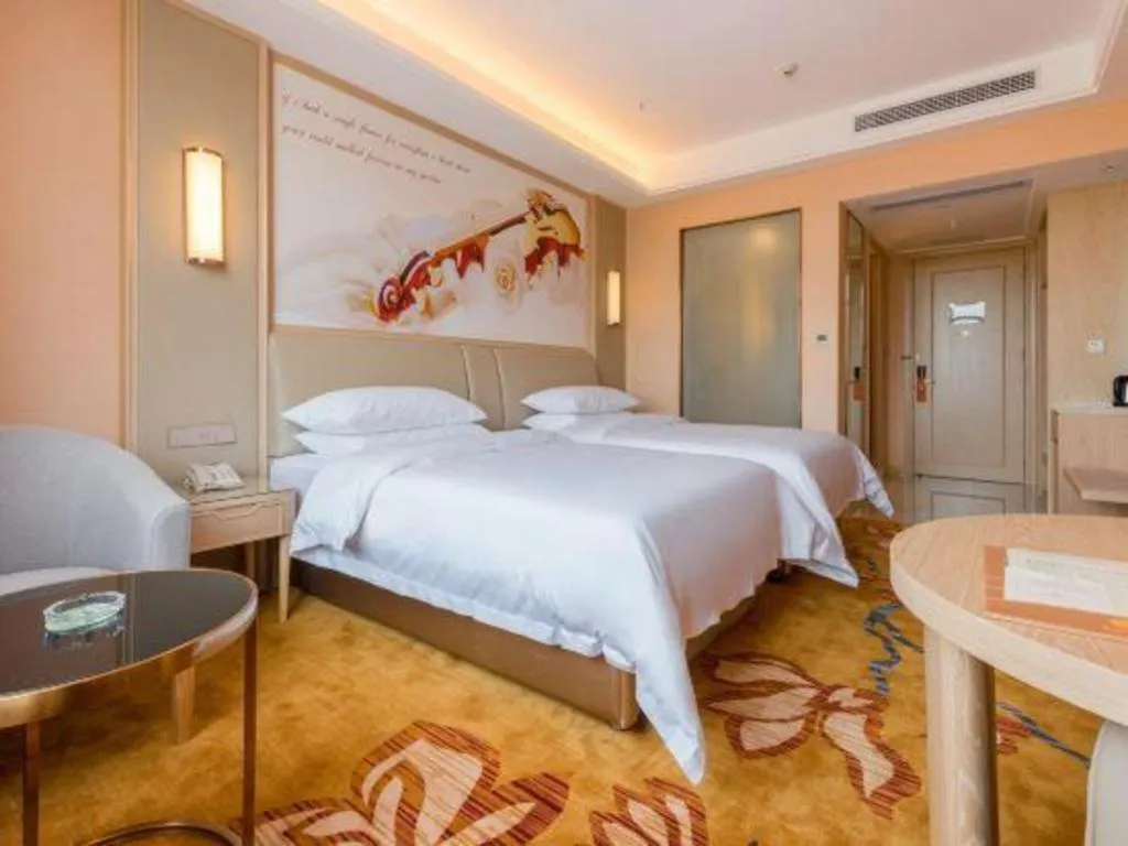 Bed in Vienna Hotel Chongqing Jiangjin Shuangfu