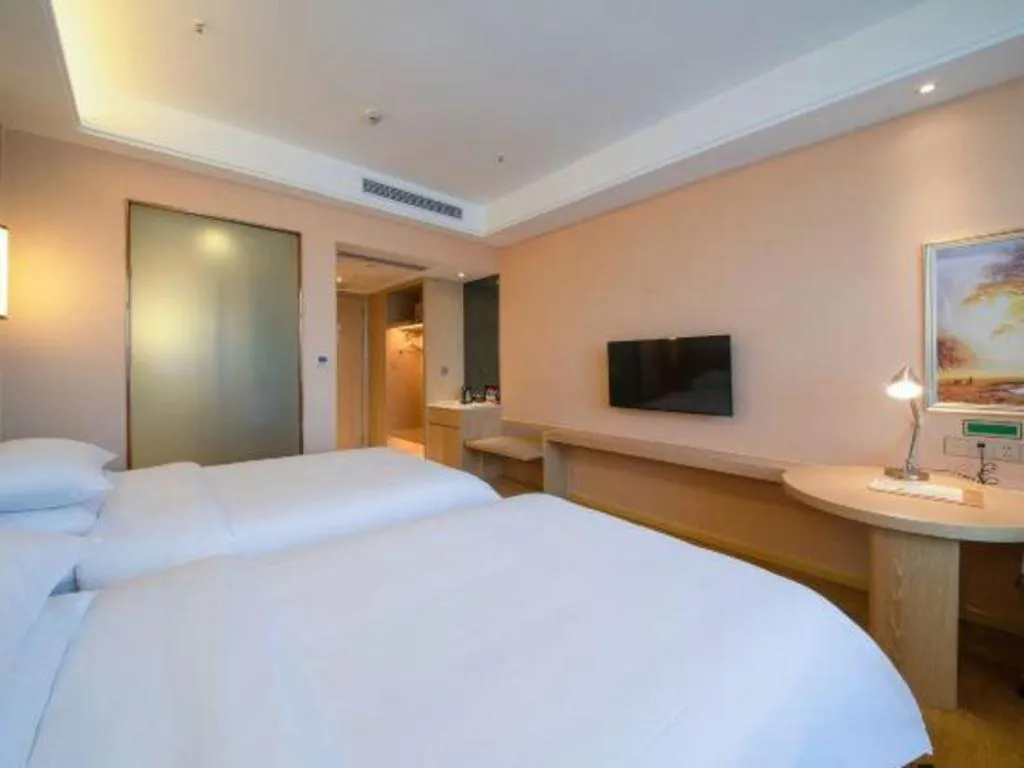 Bed in Vienna Hotel Chongqing Jiangjin Shuangfu