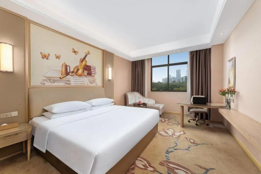 Bed in Vienna Hotel Chongqing Jiangjin Shuangfu