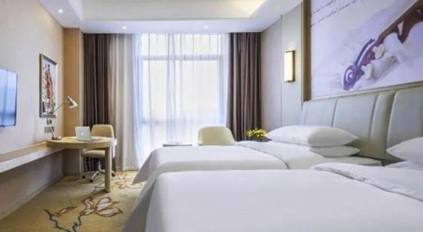 Bed in Vienna Hotel Chongqing Jiangjin Shuangfu