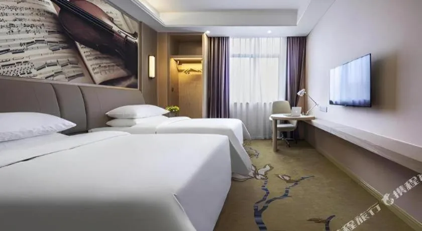 Bed in Vienna Hotel Chongqing Jiangjin Shuangfu