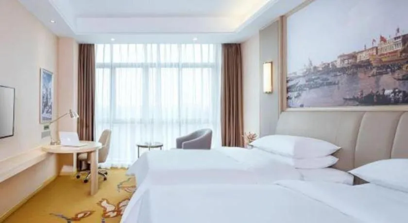 Bed in Vienna Hotel Chongqing Jiangjin Shuangfu