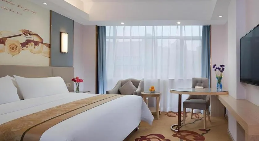 Bed in Vienna Hotel Chongqing Shiqiaopu Metro Station