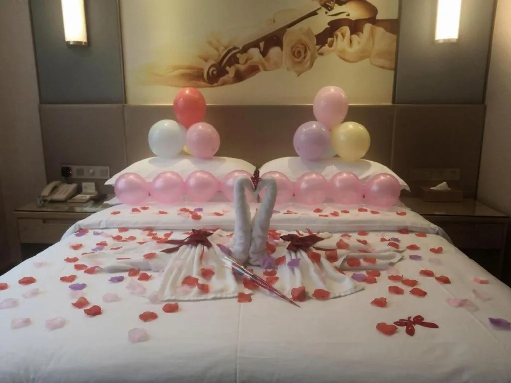 Bed in Vienna Hotel Chongqing Shiqiaopu Metro Station