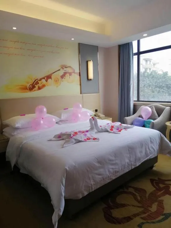 Bed in Vienna Hotel Chongqing Shiqiaopu Metro Station