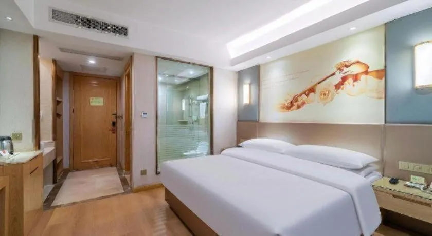 Bed in Vienna Hotel Chongqing Shiqiaopu Metro Station