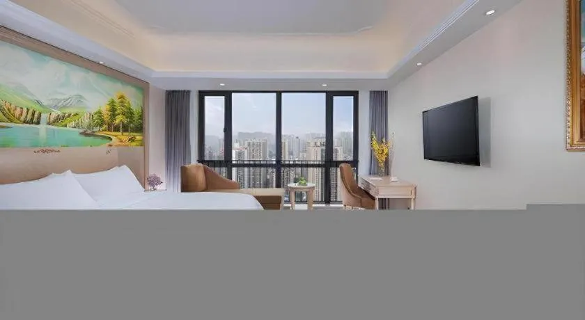 Bed in Vienna Hotel Chongqing Yangjiaping Pedestrian Street Light Railway Station