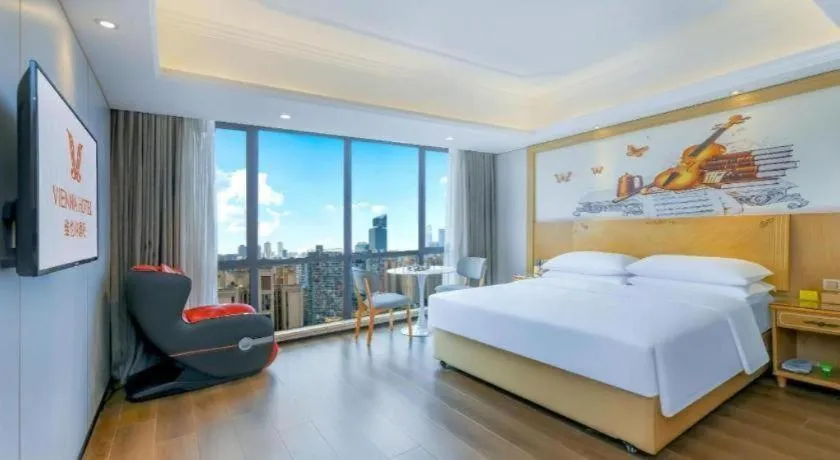 Bed in Vienna Hotel Chongqing Yangjiaping Pedestrian Street Light Railway Station