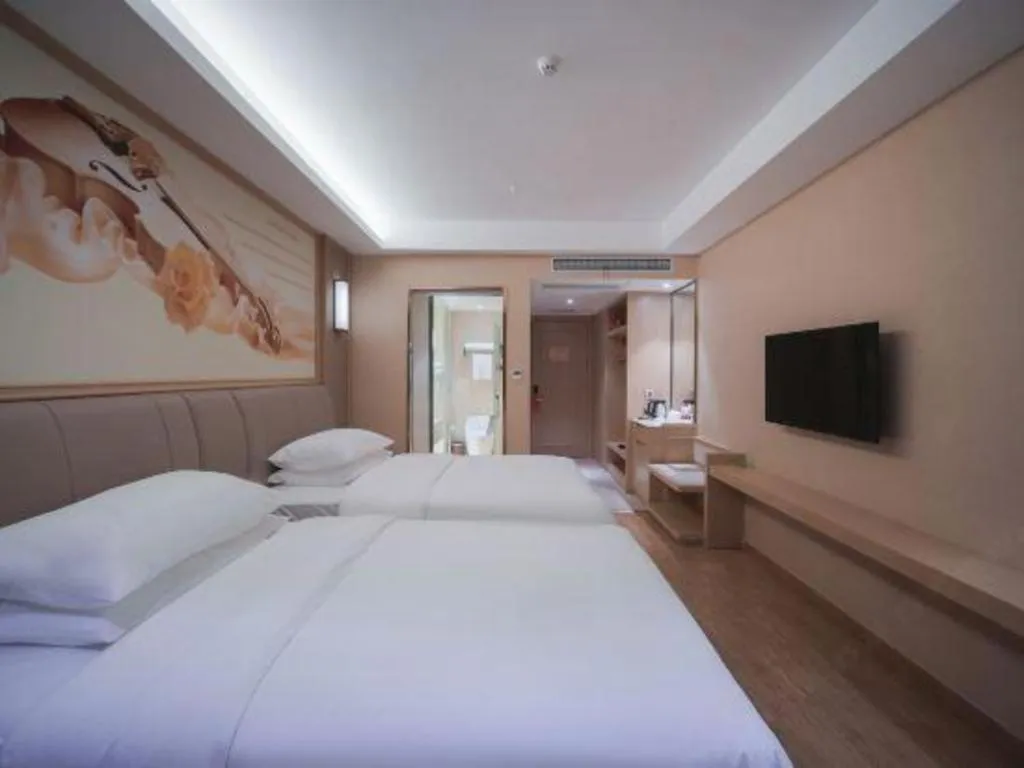 Bed in Vienna Hotel Chongqing Yangjiaping Pedestrian Street Light Railway Station