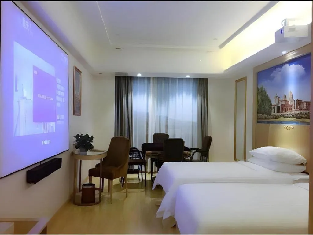 Bed in Vienna Hotel Chongqing Yangjiaping Pedestrian Street Light Railway Station