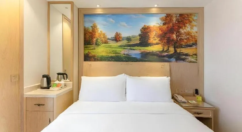 Bed in Vienna Hotel Chongqing Yangjiaping Pedestrian Street Light Railway Station