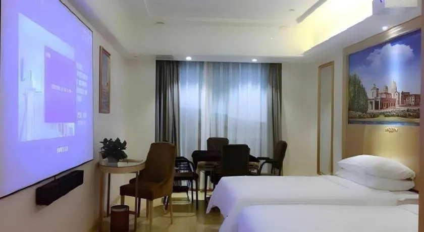 Bed in Vienna Hotel Chongqing Yangjiaping Pedestrian Street Light Railway Station