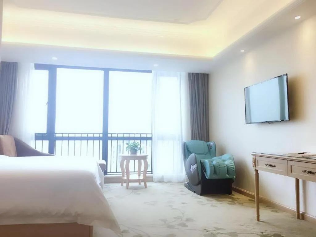 Bed in Vienna Hotel Chongqing Yangjiaping Pedestrian Street Light Railway Station