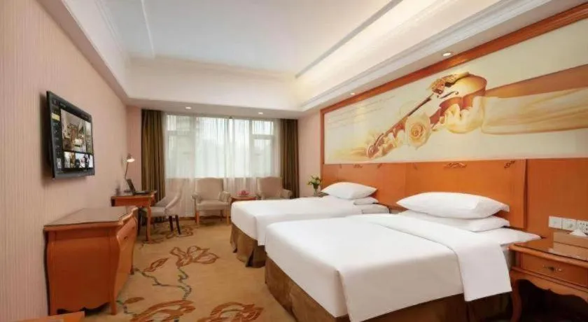 Bed in Vienna Hotel Xi'an Xijing Hospital Tonghuamen Metro Station