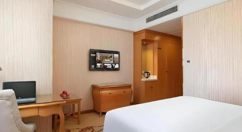 Bed in Vienna Hotel Xi'an Xijing Hospital Tonghuamen Metro Station