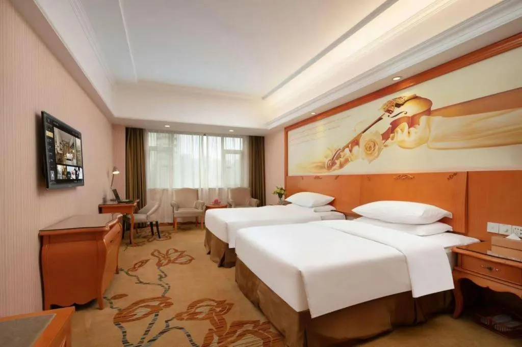 Bed in Vienna Hotel Xi'an Xijing Hospital Tonghuamen Metro Station