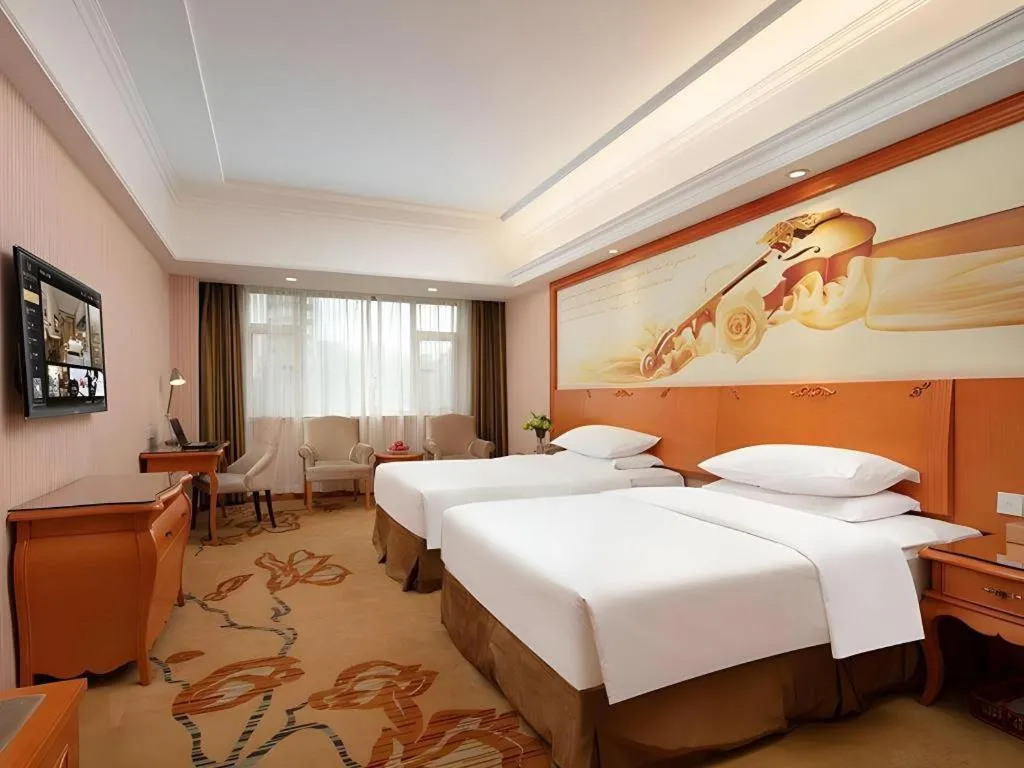 Bed in Vienna Hotel Xi'an Xijing Hospital Tonghuamen Metro Station