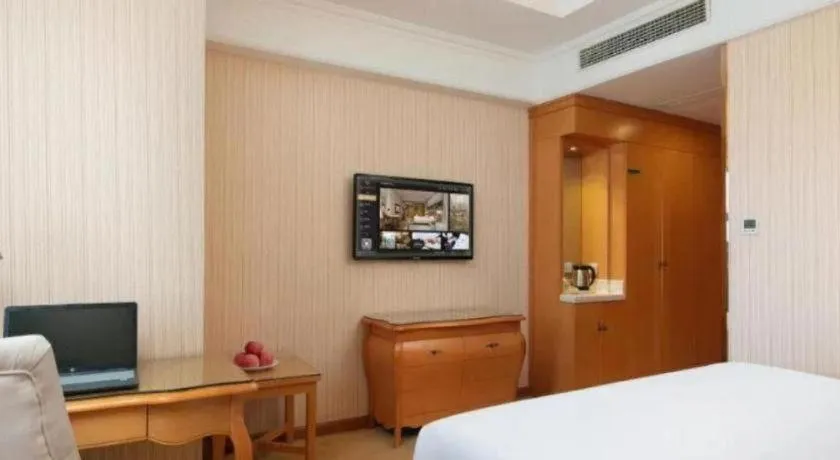 Bed in Vienna Hotel Xi'an Xijing Hospital Tonghuamen Metro Station