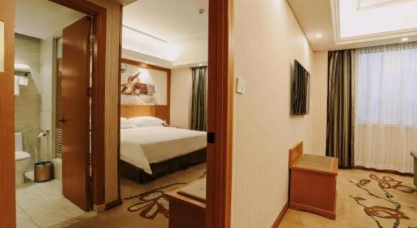 Bed in Vienna Hotel Xi'an Xijing Hospital Tonghuamen Metro Station