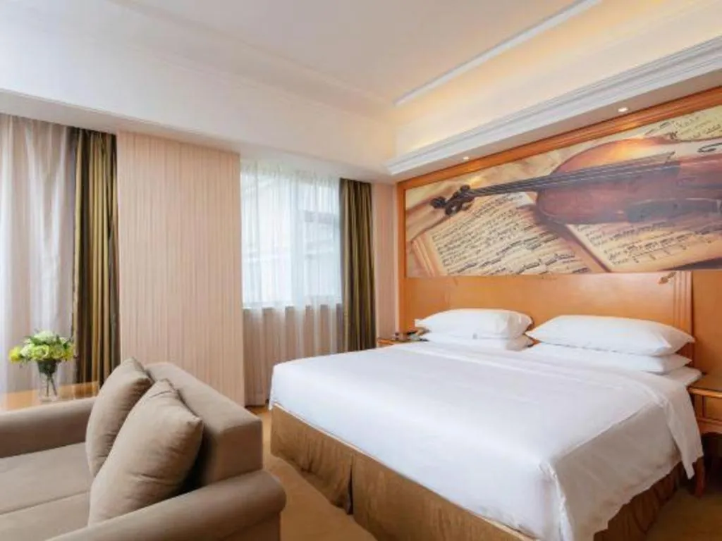 Bed in Vienna Hotel Xi'an Xijing Hospital Tonghuamen Metro Station