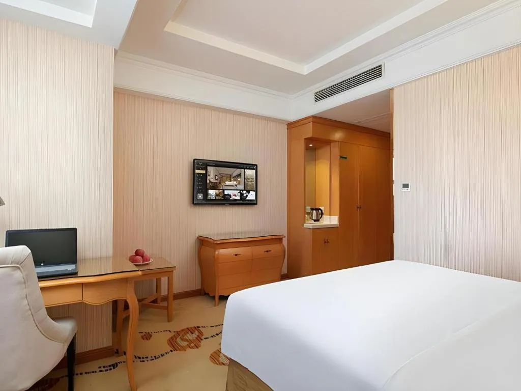 Bed in Vienna Hotel Xi'an Xijing Hospital Tonghuamen Metro Station