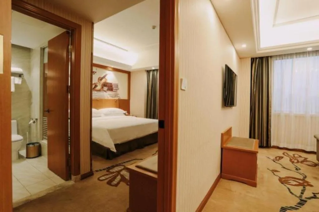 Bed in Vienna Hotel Xi'an Xijing Hospital Tonghuamen Metro Station