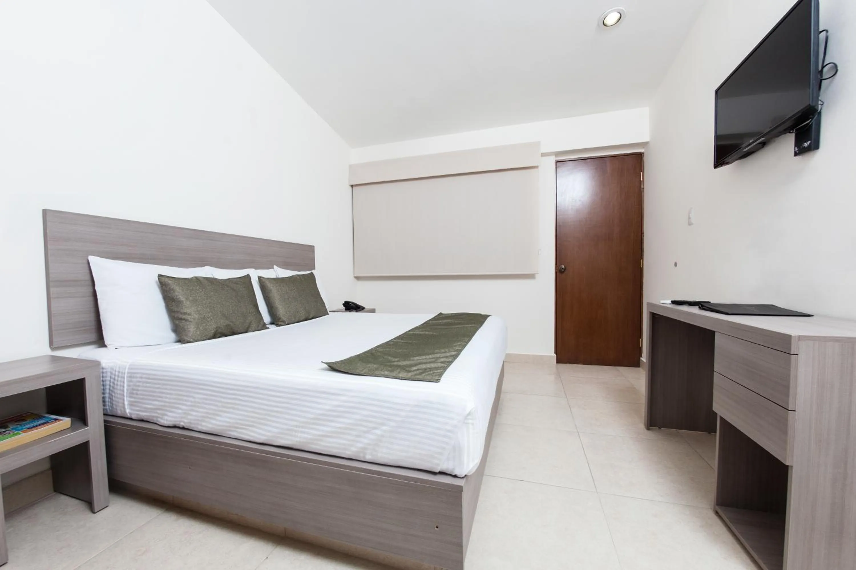 Bed in Hotel La Riviera