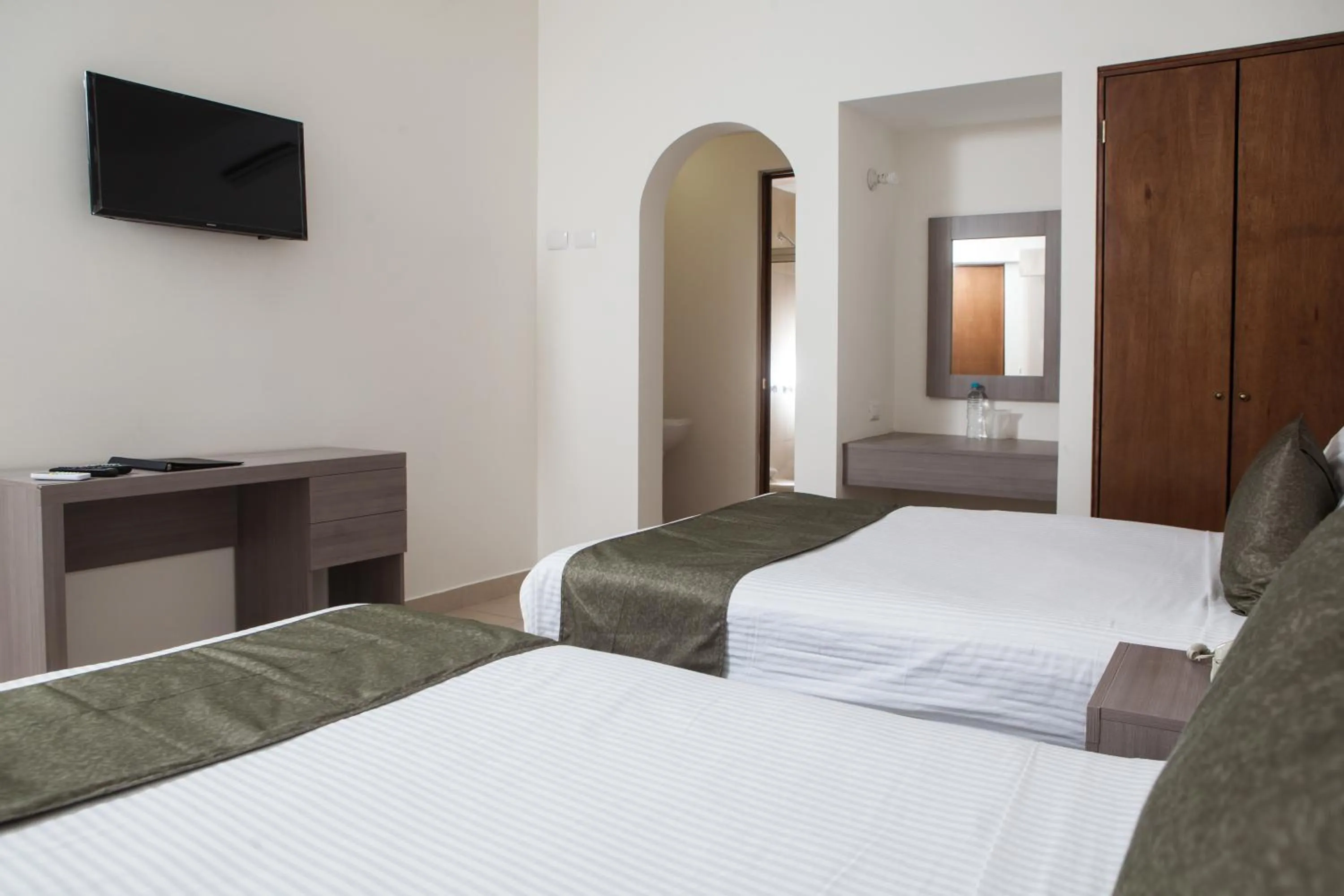 Bedroom in Hotel La Riviera