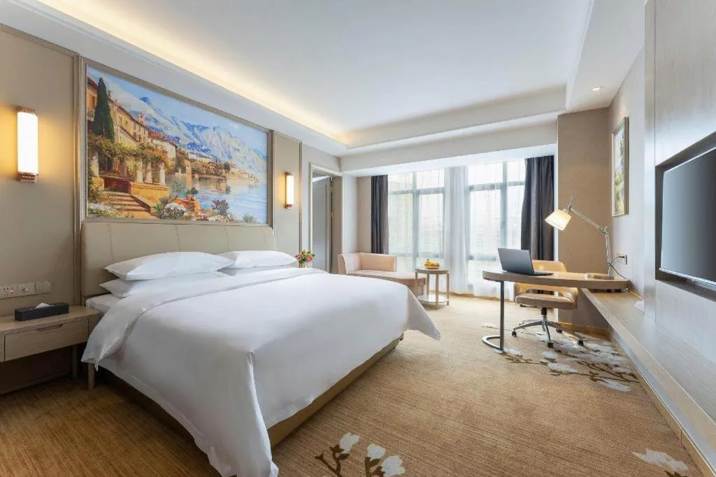 Bed in Vienna Hotel Jiangxi Fuzhou Yihuang