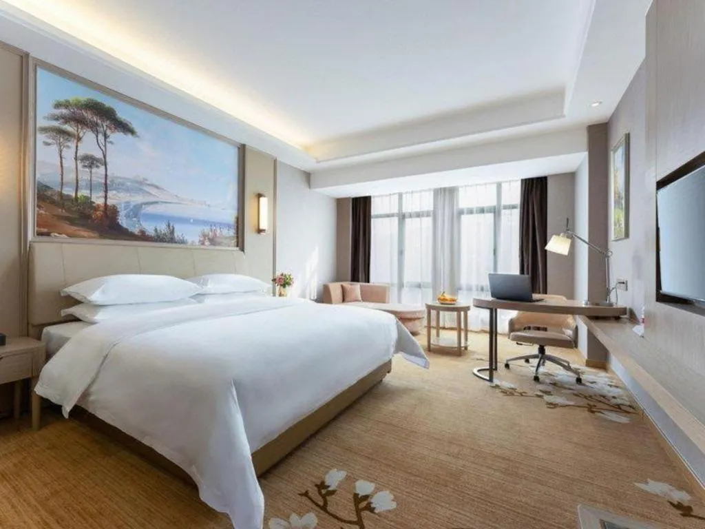 Bed in Vienna Hotel Jiangxi Fuzhou Yihuang