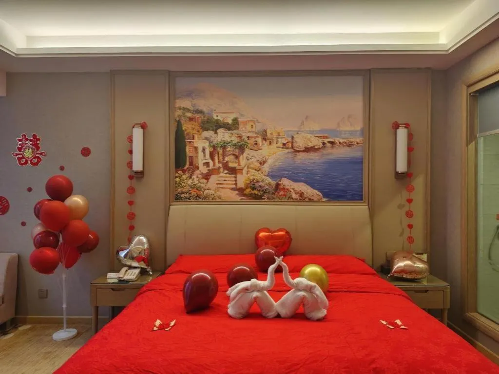 Bed in Vienna Hotel Jiangxi Fuzhou Yihuang