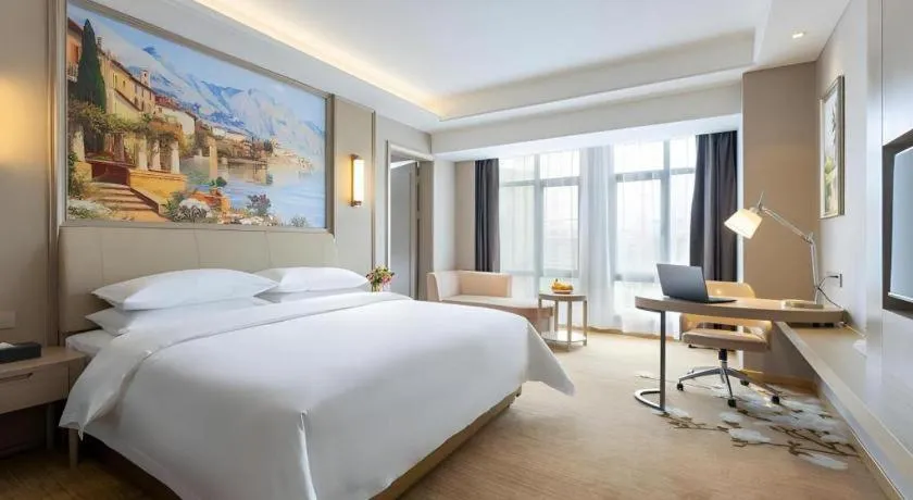 Bed in Vienna Hotel Jiangxi Fuzhou Yihuang
