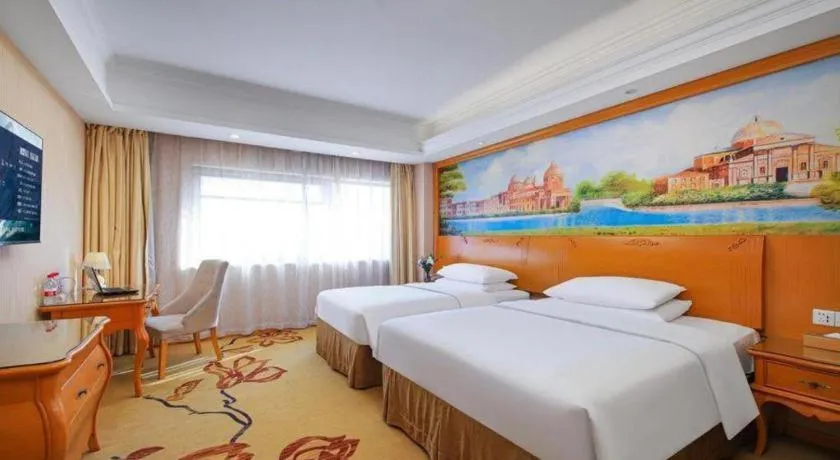 Bed in Vienna Hotel Suzhou Yangcheng Lake Fashion Stage