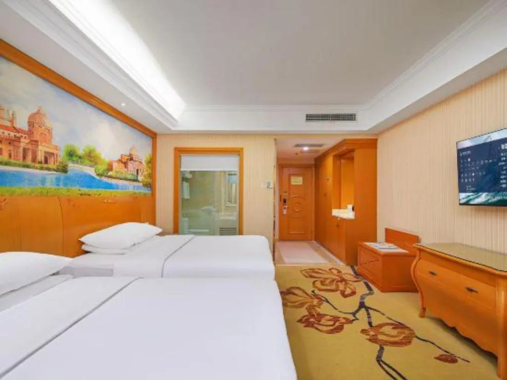 Bed in Vienna Hotel Suzhou Yangcheng Lake Fashion Stage