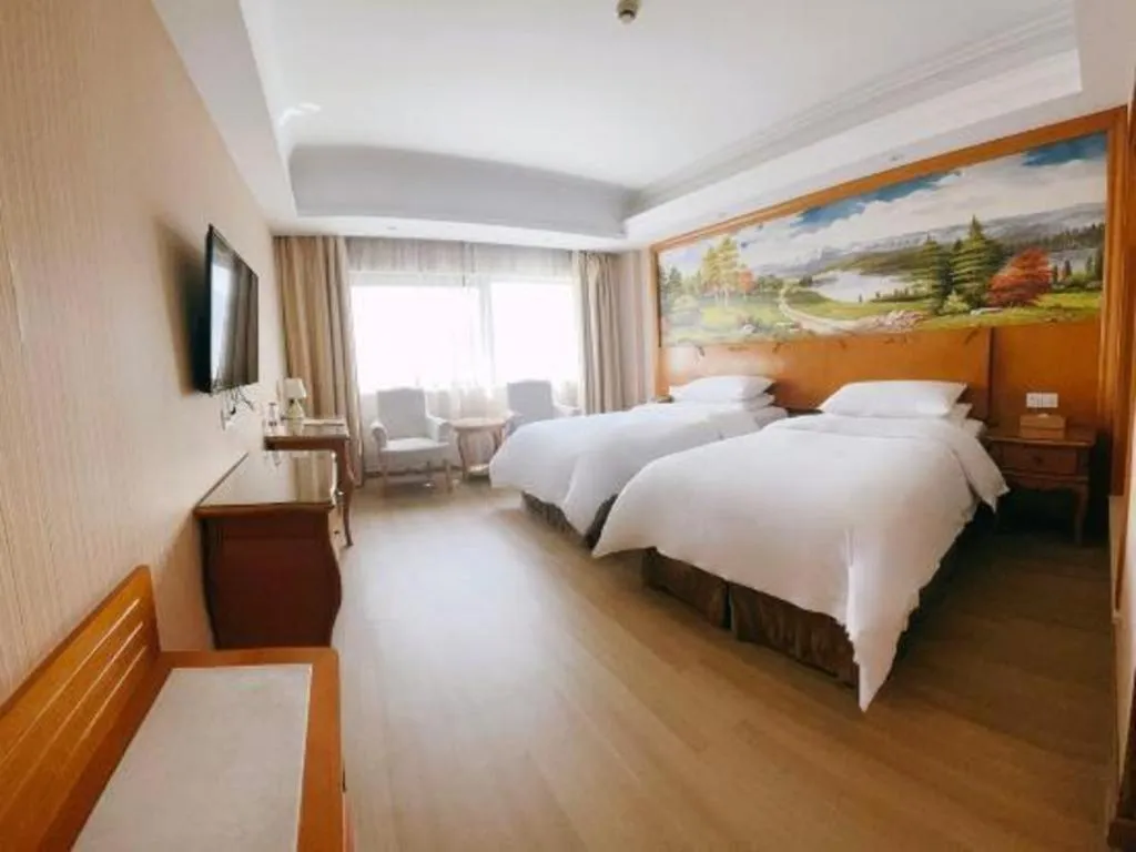 Bed in Vienna Hotel Suzhou Yangcheng Lake Fashion Stage